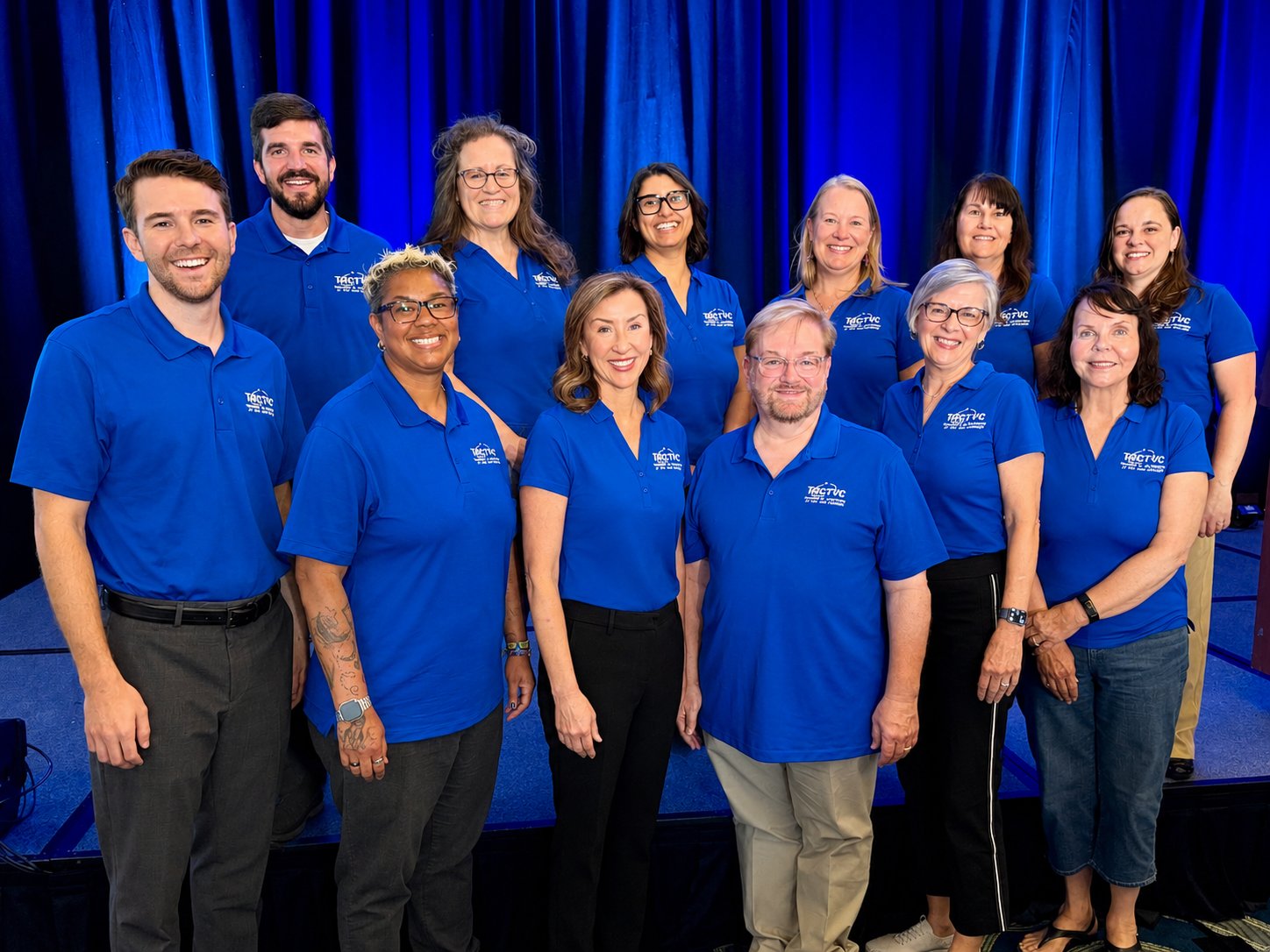 The TACTYC Board of Directors, in matching TACTYC polo shirts